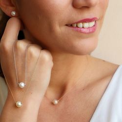 03-173851A Bonito y elegante colgante mujer en oro con perla cultivada