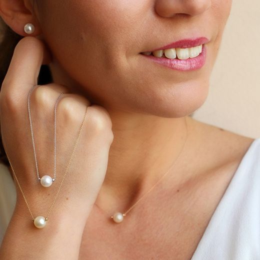 03-173851B Colgante de mujer elegante en oro blanco y perla cultivada