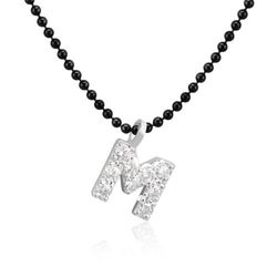 03-186008 Colgante mujer muy extremado inicial grande de oro blanco con diamantes