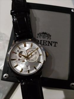 Reloj Orient de hombre automático 147-FET0P004W0 Indicador del día de la semana y calendario, indicador del sol y luna.