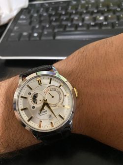 Reloj Orient de hombre automático 147-FET0P004W0 Indicador del día de la semana y calendario, indicador del sol y luna.