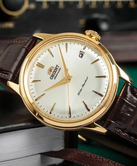 147-RA-AC0028S30B Reloj Orient Bambino automático de hombre bonito y elegante, calendario con correa de piel resistente al agua 30 metros (3atm)