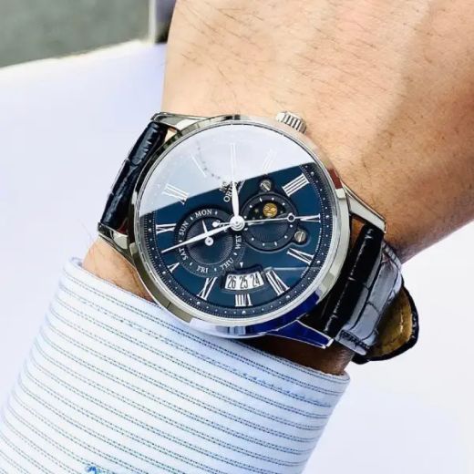 147-RA-AK0011D30B Reloj Orient de hombre automático indicador del día de la semana, calendario e indicador sol y luna.
