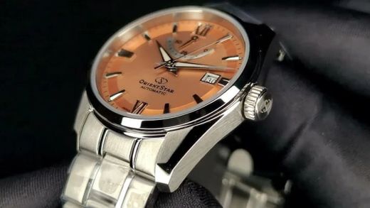 149-RE-AU0108G00B Reloj Orient Star automático para hombre esfera rosa muy elegante 50 metros acero inoxidable 316L reserva de carga 50H