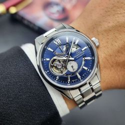 149-RE-AV0003L00B Reloj Orient Star automático de hombre esfera azul Resistencia al agua 100 metros (10atm) cristal zafiro