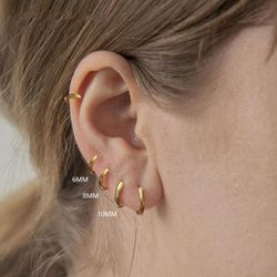 99-AE1 Pendientes unisex de aros o criollas en oro de 18K, superficie lisa y pulida