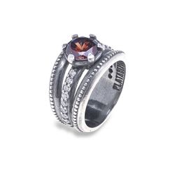 WR100X Anillo Plata de Palo mujer de Plata 925 con circonitas blancas y piedra facetada marrón elaborado en plata de ley asegurando una calidad excepcional y un acabado impecable y duradero