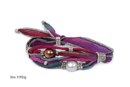 BRU1192g Pulsera la Bruixeta, compromiso