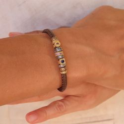 CB37A Pulsera Plata de Palo mujer cuero, bronce y circonitas