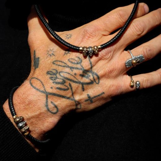 Collar Plata de Palo tres calaveras modelo Rif de Plata 925, cuero y bronce