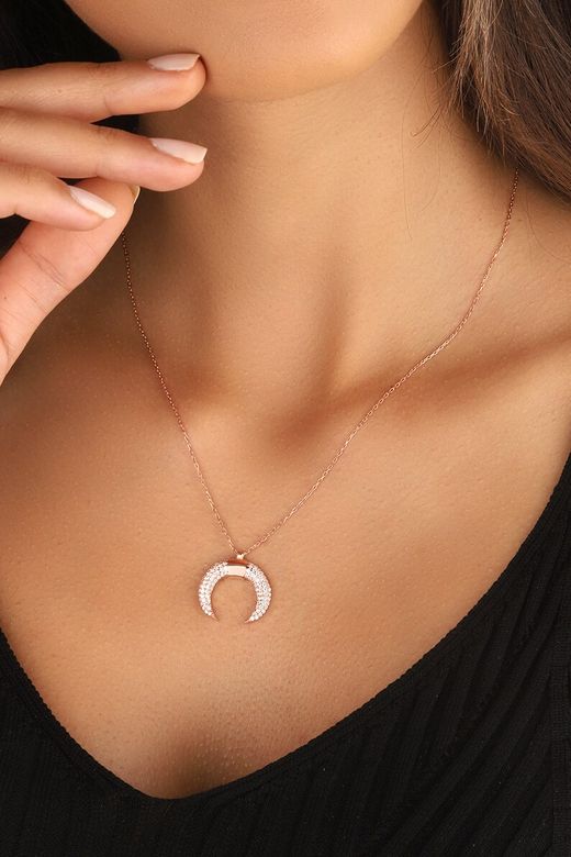 Gargantilla media luna invertida en oro de 18 kilates con circonitas bonita y elegante