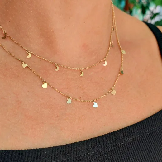 Gargantilla collar de mujer elaborado en oro de ley 18K cadena forzada decorada con siete lunas