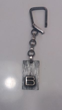 Llavero original en plata de ley envejecida con inicial