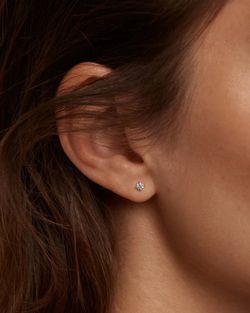 Pendientes unisex tipo botón oro blanco de 1ª ley con circonitas