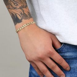 PU1210 Pulsera unisex en Oro de 18K es el complemento perfecto para añadir un toque moderno y elegante