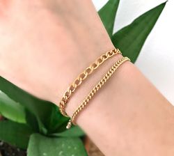 PU1213 Pulsera unisex en oro de 18K terminación en brillo con eslabones tipo barbado muy elegante