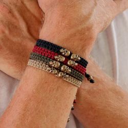 SB122G Pulsera Plata de Palo unisex de nylon granate con calaveras de bronce colección Fiorven