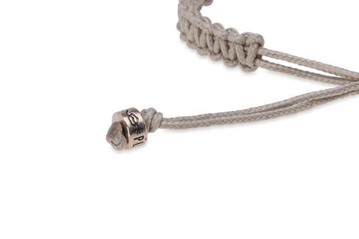 SB123B Pulsera Plata de Palo unisex de nylon beige con dos calaveras de plata 925 colección Valdren