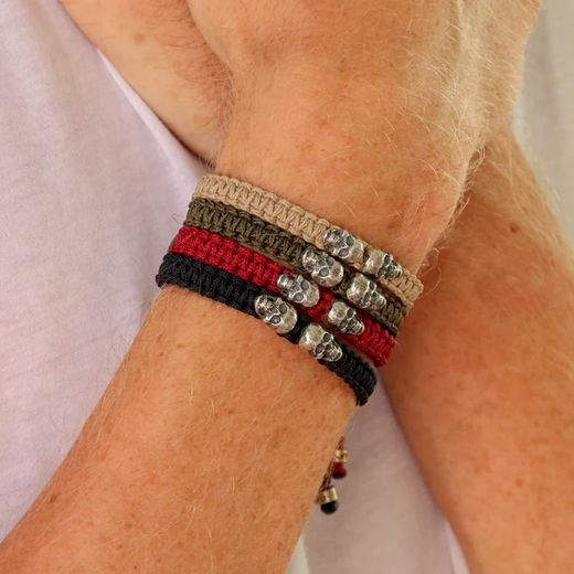 SB123B Pulsera Plata de Palo unisex de nylon beige con dos calaveras de plata 925 colección Valdren