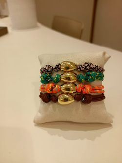 SKU: 05-001117 Pulsera unisex con Pepita de oro de 18k. Acabada con nudos marineros autoajustable